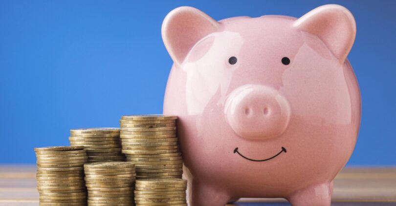 front-view-finance-elements-with-pink-piggy-bank